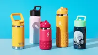 A few of the best water bottles for kids on a blue background.