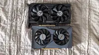 The Nvidia GeForce RTX 3050 and the AMD Radeon RX 6500 XT laying flat on a sheet.
