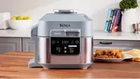 The Ninja Speedi air fryer sitting on a kitchen island.