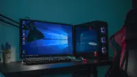 A gaming desktop pc setup complete with a gaming chair.