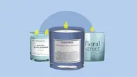 A set of candles on display in front of a background.
