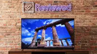 The Sony A80K OLED TV displaying 4K/HDR content in a living room setting.