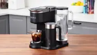 A Keurig machine sitting on a kitchen counter.