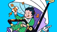 A baby in buckled into a stroller