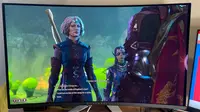 A half-elf talking to a vampire in Baldur's Gate 3 on screen of the Alienware AW3225QF monitor.