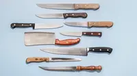 A knife set on a light blue background.