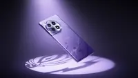 The back of the purple Genshin Impact edition OnePlus 12R smartphone floating while illuminated by a purple spotlight.
