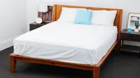 Brooklinen bed sheets are shown on a bed for testing in the Reviewed labs.