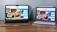 An Apple MacBook Air and iPad Pro show off bright screens as they sit on a table surface