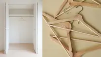 An empty closet next to a pile of empty hangers