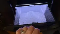 GoveeLife Smart Nugget Ice Maker Pr ice drawer open with violet lighting