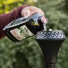 Product image of TIKI BiteFighter Torch Fuel + 2 Free Bamboo Torches