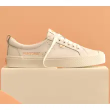 Product image of Cariuma Pantone Peach Fuzz Sneakers