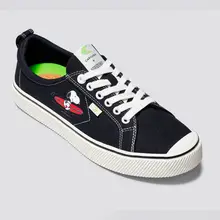 Product image of Cariuma OCA Low Peanuts Surf Black Canvas