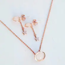 Product image of Pura Vida Saturn Necklace & Earring Set