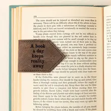 Product image of Keep Reality Away Magnetic Bookmark