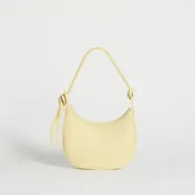 Product image of Reformation Mini Rosetta Shoulder Bag in 'Parmesan'
