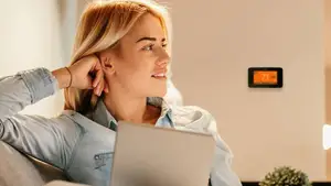 What is a smart thermostat and how does it work?