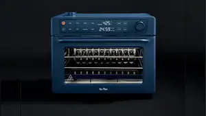 Wonder Oven Pro toaster oven on a black background