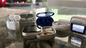 A grouping of wireless earbuds on a table