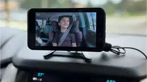 Babyvue Wireless Baby Car Monitor mounted on a dashboard.