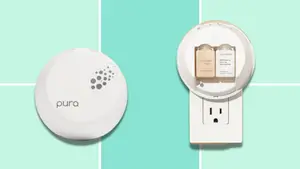 Pura smart essential oil diffuser on a blue background