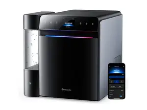 Black Govee Smart Countertop Ice Maker 2 on a kitchen counter, open and showing ice inside.