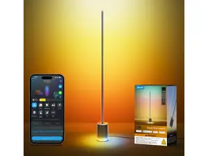 Tall LED floor lamp casting blue ambient light in a modern hallway, with illuminated base and vertical light tube creating colorful mood lighting.