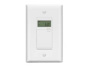 White Lider 7-Day Programmable Digital Timer Switch being installed with electrical wires seen hanging out of a grey wall.