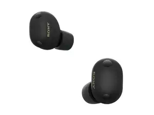 A grouping of wireless earbuds on a table