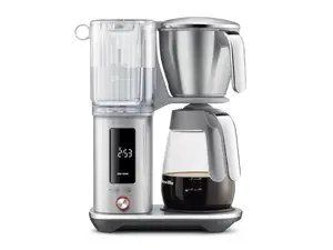 Two coffee pots sit on a beige background surrounded by coffee beans