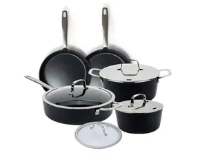 Alva Ceramic Cookware Set sitting on top of spider-burner stovetop with a pan cooking chicken.