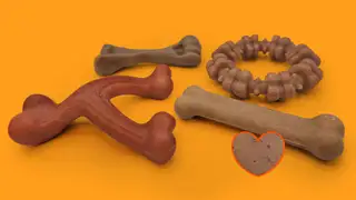 Four Nylabone chew toys in front of an orange background