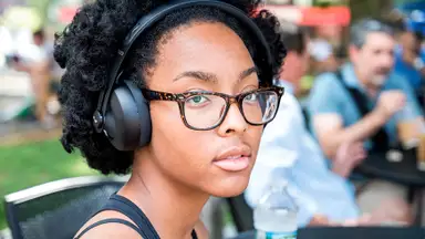 The Nuraphones over-ear headphones being worn by a person