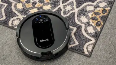 The Shark IQ R101AE is a self-emptying robot vacuum