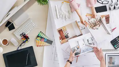 Two people deciding on new interior decorating designs.