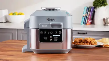 The Ninja Speedi air fryer sitting on a kitchen island.
