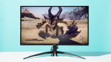 The Acer Nitro XV275K (P3biipruzx) on a white table and blue background.