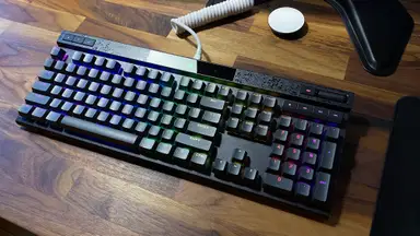 The Corsair K70 Max RGB on a table.