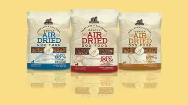 Three bags of various Redbarn dog food.