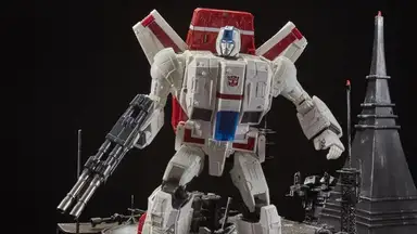 A Transformers action figure on a black background.