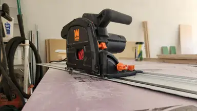 Wen Track Saw on workbench inside of garage.