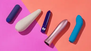 A collection of the best bullet vibrators including the PlusOne bullet vibrator​, the Maude Vibe, the Lovehoney Magic Bullet, the Femme Funn Bougie Bullet and the Je Joue G-Spot Bullet Vibrator for Intense Pleasure on a pink and orange background.