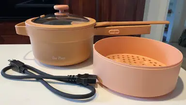 The Perfect Power Pot with its own beechwood spatula and steamer basket.