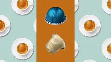 A blue Vertuo Nespresso capsule and a gold Original Nespresso capsule on an orange background over a background of cups of espresso shot from overhead.