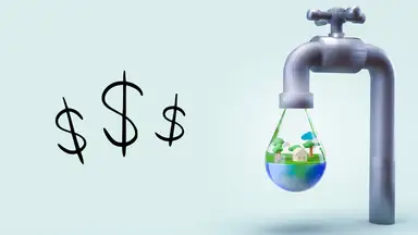 A water faucet dripping a large drop filled with a home