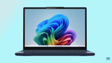 A Lenovo IdeaPad Slim 3i open on a blue background with swirling colors on the desktop