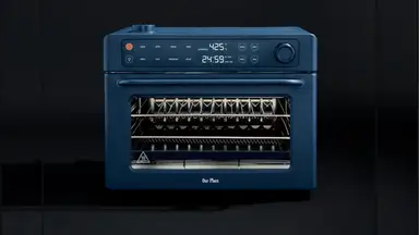 Wonder Oven Pro toaster oven on a black background