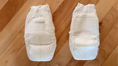 Two pairs of Coterie The 360 training underwear on wooden surface.