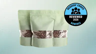 Three bags of coffee on an aqua background